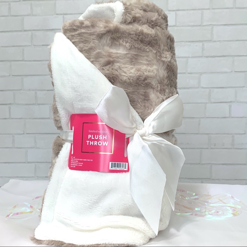 Faux fur plush throw blanket cream and tan from Ulta